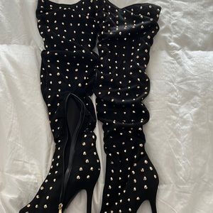 Slightly worn knee high boots. Worn once